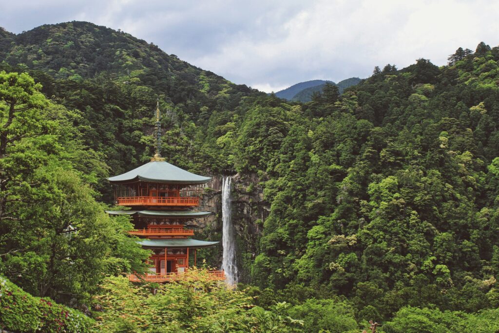 The majestic Japanese pagoda next to the Nachi waterfall along the Kumano Kodo, a sacred landscape on the Kii Peninsula.