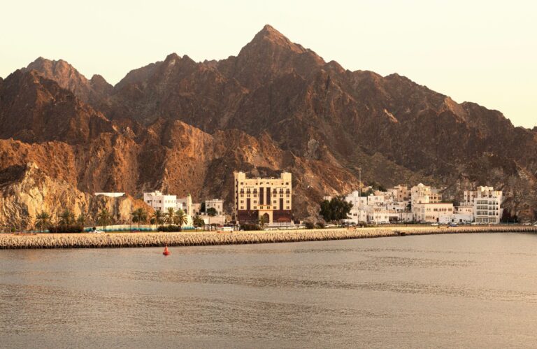 Coastal landscape at sunset in Oman, reflecting the historical and geographical charm of the frankincense route.