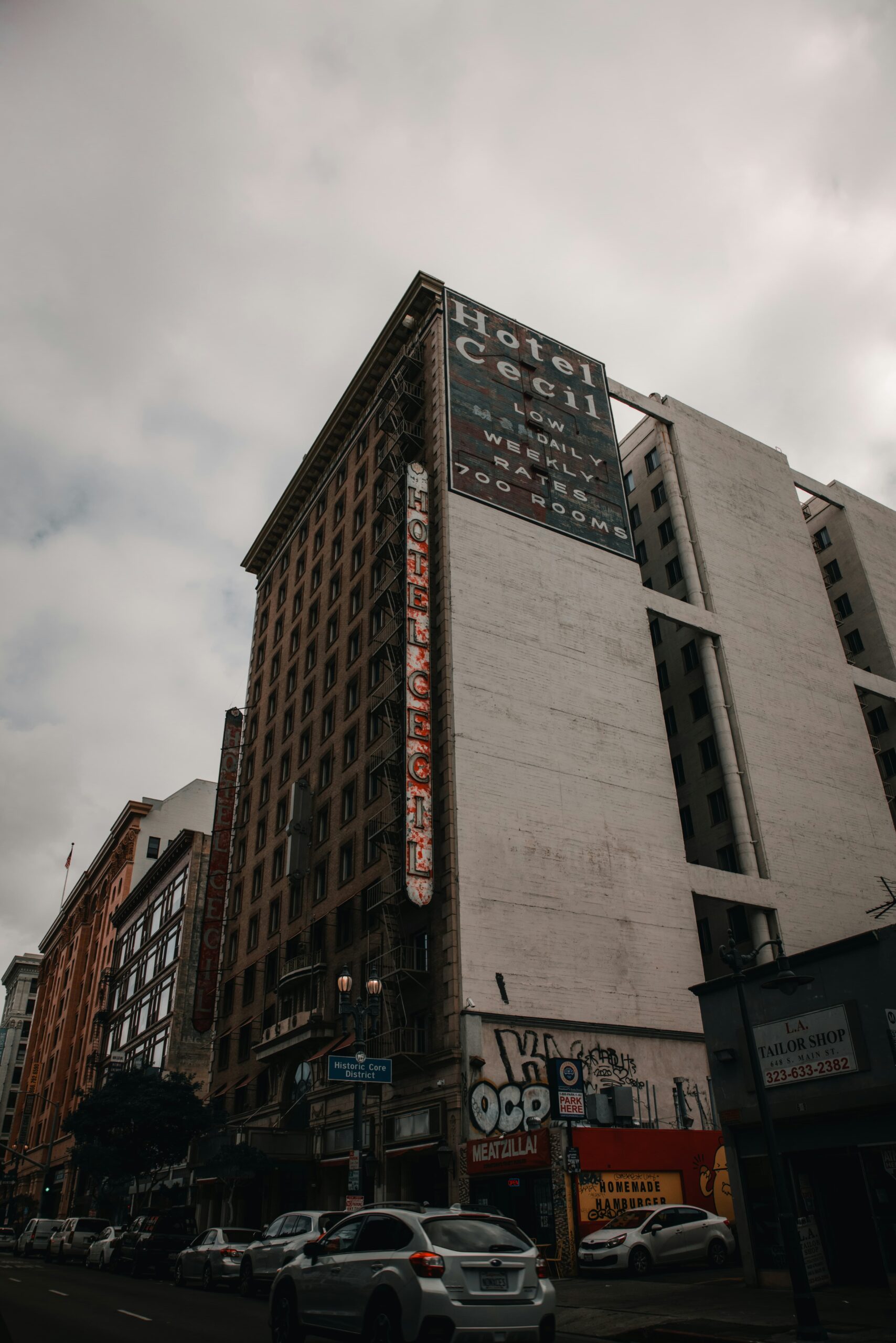 Exterior view of the Cecil Hotel building, known for its mysterious and haunting past in Los Angeles.