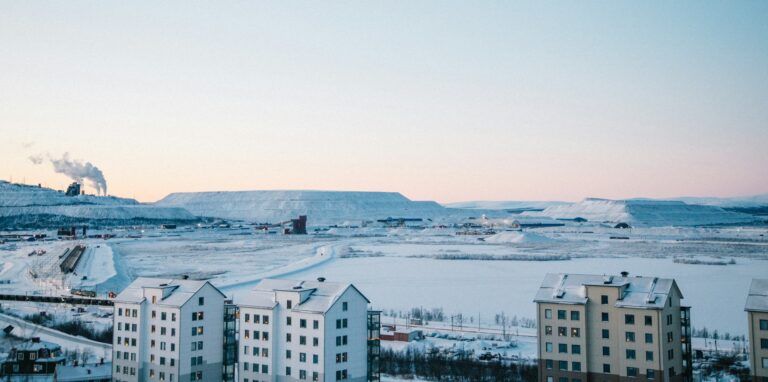 Winter view of Kiruna with the iron ore mine in the background, Sweden